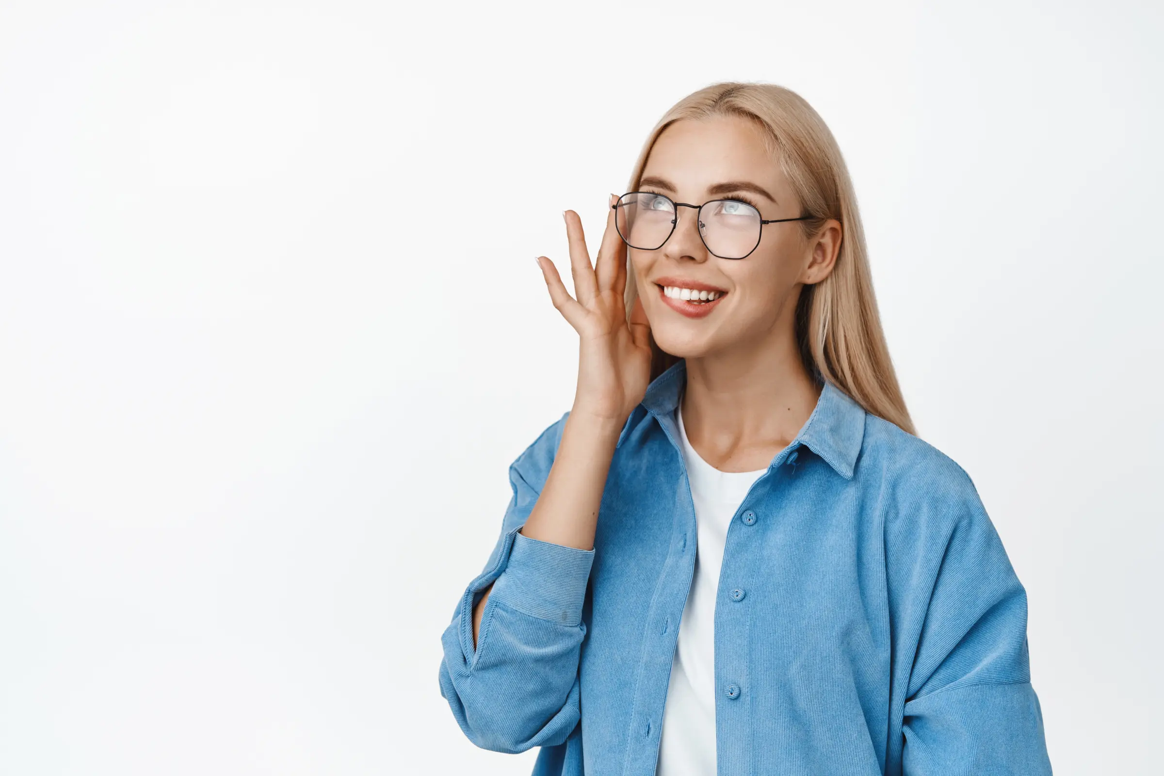 beautiful-blond-woman-glasses-smiling-gazing-flirty-upper-left-corner-standing-white-background beautiful-blond-woman-glasses-smiling-gazing-flirty-upper-left-corner-standing-white-background